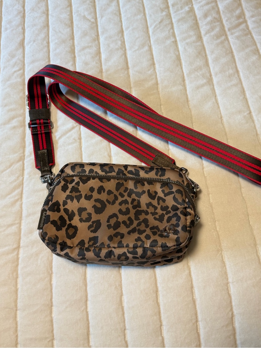 Lulu Lemon Leopard Print Crossbody Bag with Red-Striped Strap